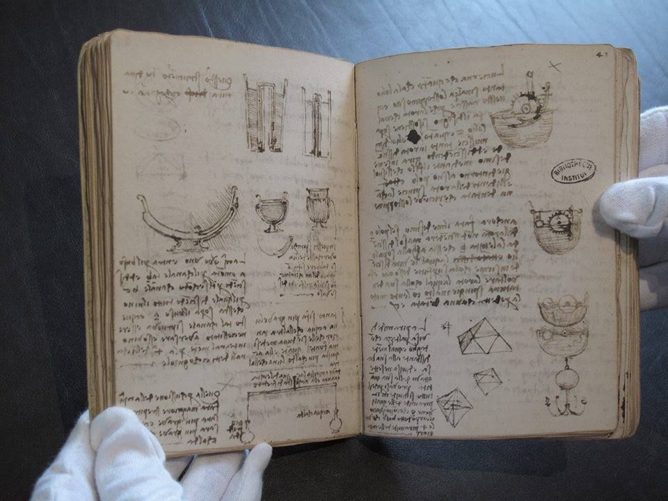A page from Leonardo da Vinci's notebooks &mdash; water wheel diagrams beside anatomical sketches beside shopping lists